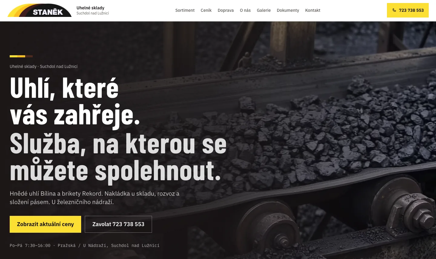 Uhlí Staněk website in development — conveyor of coal and the headline Uhlí, které vás zahřeje